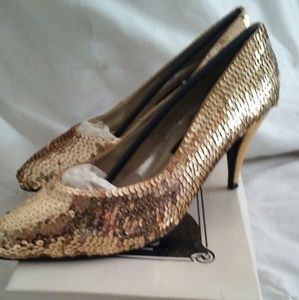 Gold high heels